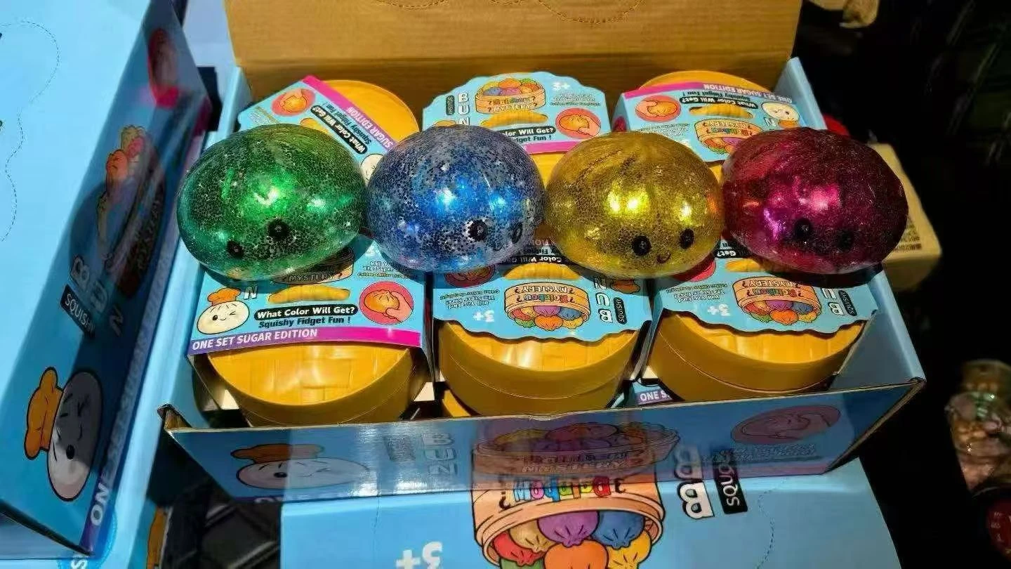 Gold Glitter Bead-Popping Bun Squishy